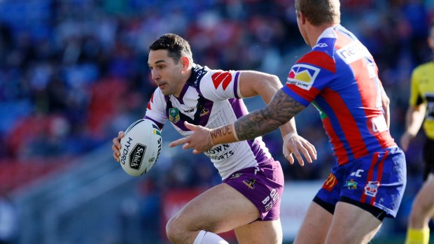 Storm's Billy Slater goes for a run against the Newcastle Knights.