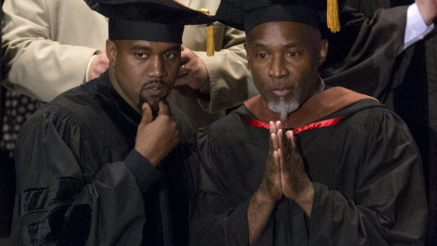 Musician Kanye West and School of the Art Institute of Chicago Professor Nick Cave attend the school's annual commencement ceremony.