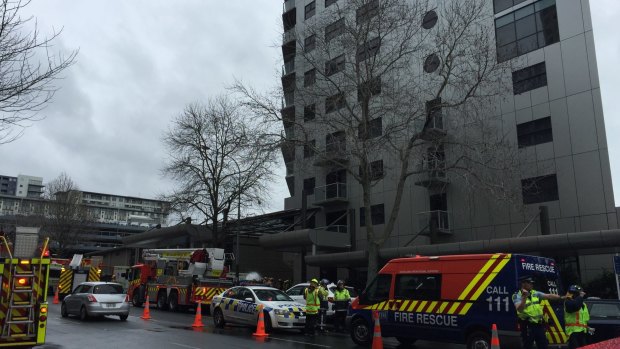 The emergency scene in Auckland on Tuesday after toxic gas flooded an inner-city hotel. 