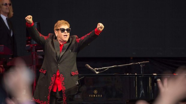 Elton John's show was light on chat and big on tunes – and the crowd loved it.