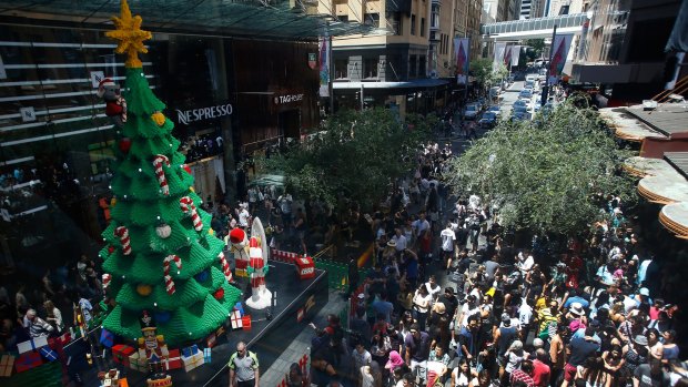 Bargain hunters: Hundreds of shoppers descend on Pitt Street shopping mall for the Boxing Day sales.