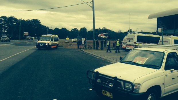 An ambulance helicopter takes off after the crash at Culburra which killed two men.