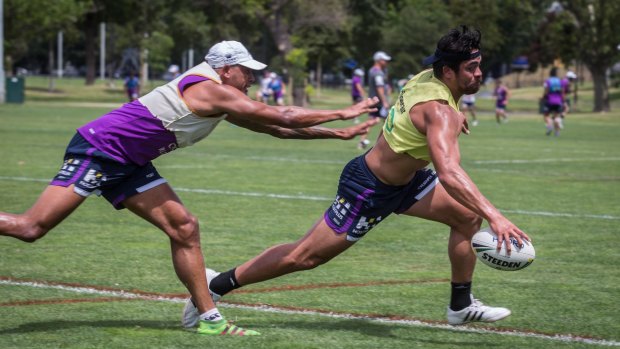 Melbourne Storm winger Young Tonumaipea dots down during a training session.