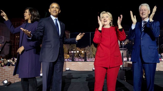 Hillary Clinton is joined on stage after her speech in Philadelphia by Barack Obama, Michelle Obama and Bill Clinton.