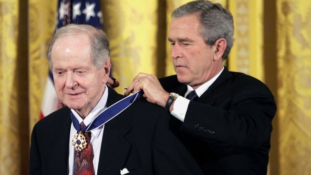  President George W. Bush presents the Presidential Medal of Freedom to historian Robert Conquest.