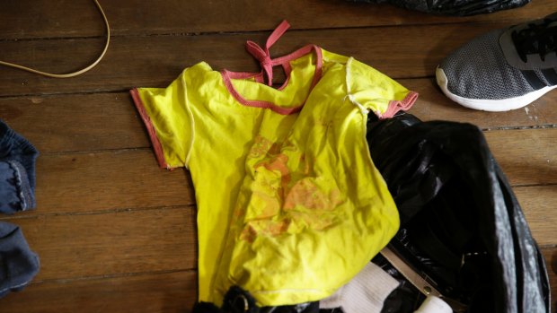 Children's clothing found on the floor of a cybersex "den" in the Philippines in April.