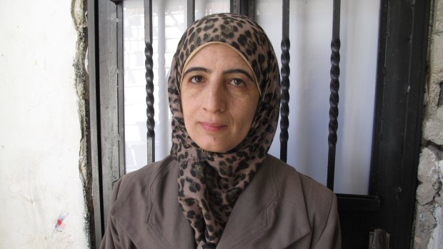 Enas al-Shalodi, mother of alleged Jerusalem vehicle attacker Abdel Rahman al-Shalodi, outside her demolished home.