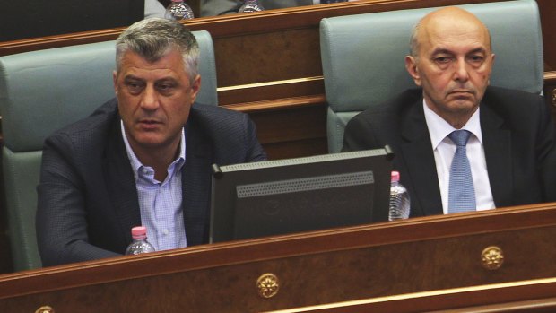 Kosovo's Prime Minister Isa Mustafa, right, next to deputy prime minister and foreign minister Hashim Thaci, in parliament, in Pristina, Kosovo, on Monday.