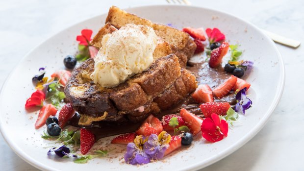 French toast sandwiched with strawberry cheesecake served with toasted coconut ice-cream.
