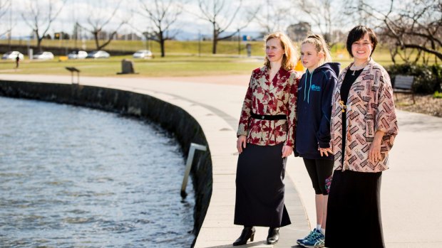 Ann Johnstone (far right) is the sister of George Reekie. Friends and family plan a tribute to him on the shores of Lake Burley Griffin on Sunday. Ann is pictured with her daughter Eleanor, 11, and their friend Jeannie Robertson.