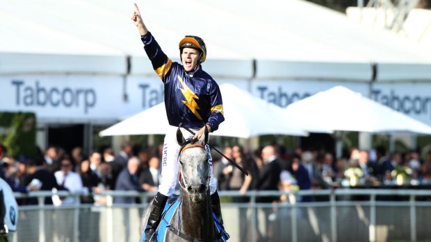 Number one: Tommy Berry celebrates after Chautauqua won the TJ Smith Stakes.