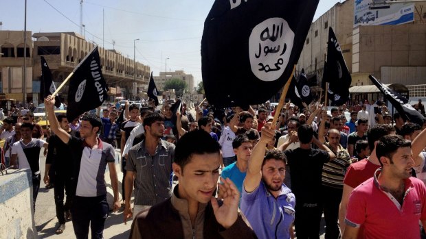 Pro al-Qaeda and Islamic State demonstrators in Mosul in 2014. IS has since taken over Mosul.