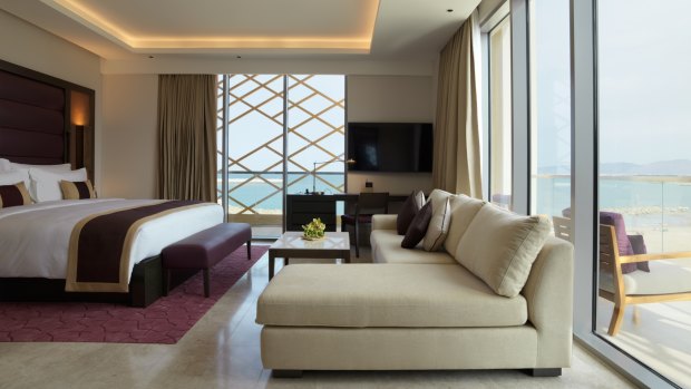 Modern luxury with views: A room at Kempinski Hotel Muscat.