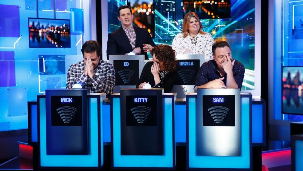 Clockwise, from back left: Ed Kavalee, Urzila Carlson, Sam Pang, Kitty Flanagan and Mick Molloy make fun of current affairs on <i>Have You Been Paying Attention?</I>.