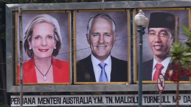 Prime Minister Malcolm Turnbull and his wife Lucy on a billboard with Indonesian President Joko Widodo near the presidential palace during their 2015 visit.