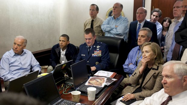 President Barack Obama and Vice President Joe Biden, along with members of the national security team, receive an update on the mission against Osama bin Laden in the Situation Room of the White House, in May 2011.