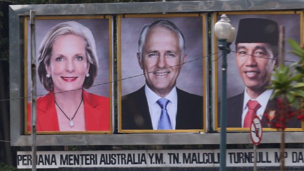 Prime Minister Malcolm Turnbull and his wife Lucy on a billboatd with Indonesian President Joko Widodo near the the Presidential Palace in Jakarta during Mr Turnbull's visit to Indonesia in November 2015. 