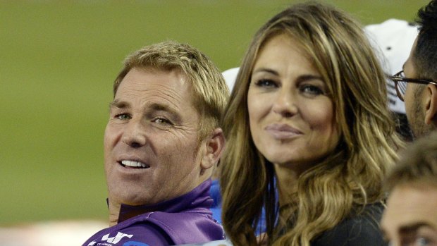 Shane Warne with Elizabeth Hurley during a cricket promotional tour in Los Angeles in November 2014.