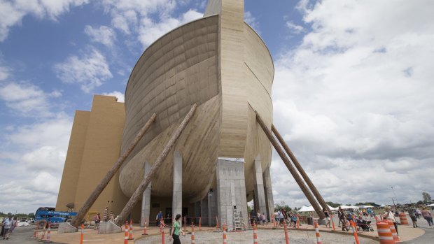 Visitors pass outside the front of former Brisbane teacher Ken Ham's replica Noah's ark.