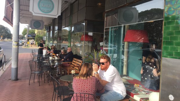 People enjoying an early morning coffee at the trendy cafes along Whatley Crescent, Maylands. 
