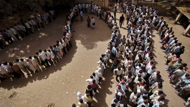 Unemployed Indians stand in a queue to register at the Employment Exchange Office in Allahabad in 2012. 
