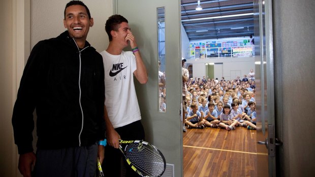 Good mates: Nick Kyrgios and Thanasi Kokkinakis visit a Melbourne primary school in 2014. 