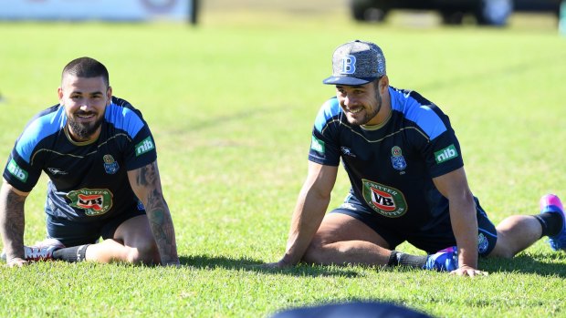 Ready to roll: Hayne trains with Gold Coast teammate Nathan Peats at Kingscliff this week.