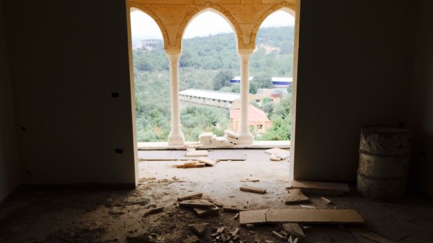 Inside the stalled Lebanese mansion of former Labor powerbroker Eddie Obeid where 17 arches greet visitors. 