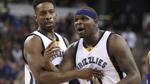 Tough cookie: Memphis Grizzlies veteran Zach Randolph is restrained by Jeff Green after he was called for a technical foul after getting into a brief altercation with Sacramento Kings centre DeMarcus Cousins.