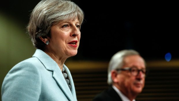 UK Prime Minister Theresa May and European Commission President Jean-Claude Juncker announce the 'Brexit divorce' agreement on Friday.