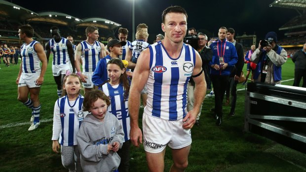 Games-record holder Brent Harvey leaves the field for the last time as a Kangaroo and possibly as an AFL footballer.