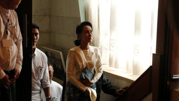 Myanmar State Counsellor Aung San Suu Kyi arrives to attend a memorial ceremony to mark one month from the killing of Ko Ni and taxi driver Ne Win.