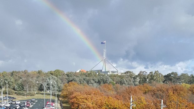 A rainbow over Parliament House. Are good times coming for Canberra? Photo by Brian Arnell.
