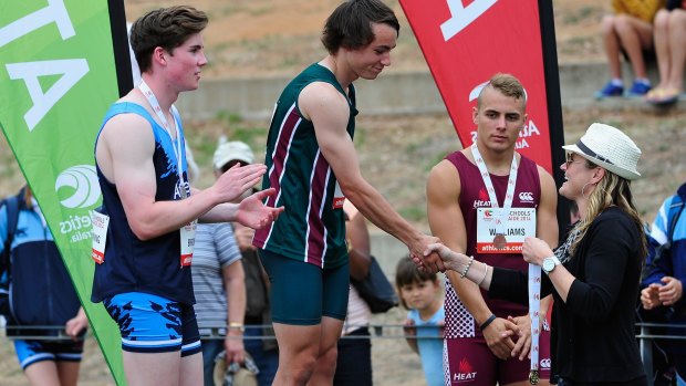 Podium finish: Trae Williams (left), Jack Hale (centre) and Rohan Browning at last year’s all-schools.