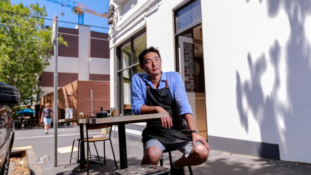 Two Birds Cafe owner Justin Lan says opening on weekends is hard for small business owners. 