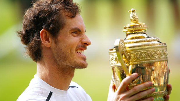 Pure joy: Andy Murray lifts the Wimbledon trophy