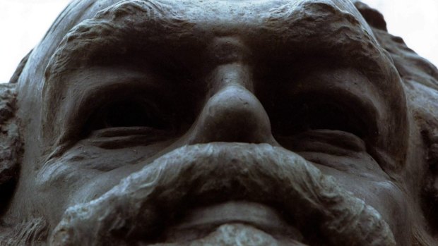 A monument to Karl Marx stands above his remains at the Highgate Cemetery in North London.