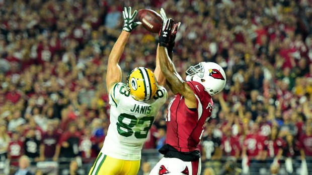 Hail Mary, round two: Jeff Janis leaps highest to haul in a pass at the end of the fourth quarter to send the game into overtime.