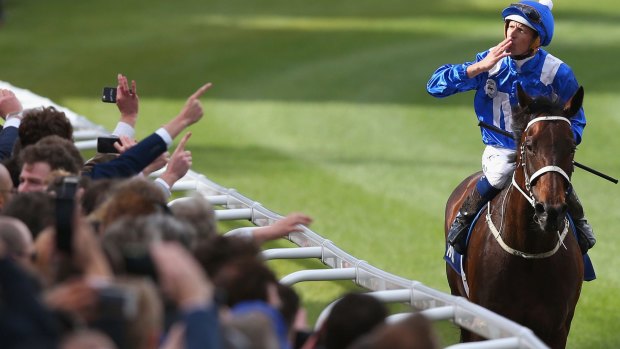 Plaudits: Hugh Bowman and Winx return to scale after winning the 2016 Cox Plate. 