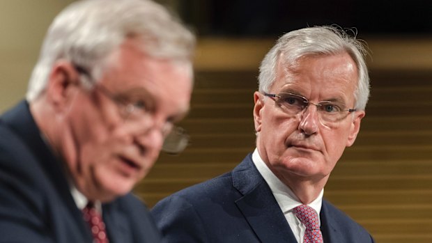 Brexit minister David Davis, left, and the EU's chief Brexit negotiator, Michel Barnier have seen early negotiations make slow progress.