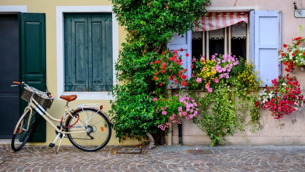 A more traditional pushbike in the colourful town of Caorle, Italy.