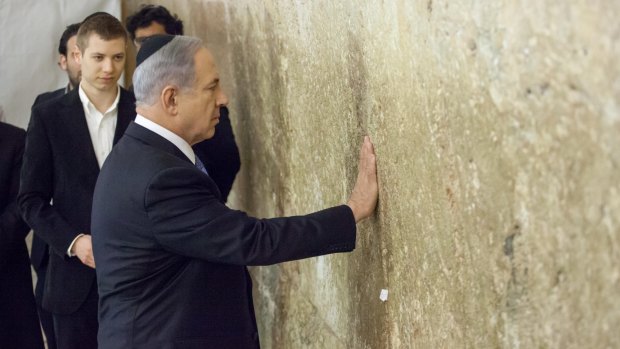 Israeli Prime Minister Benjamin Netanyahu prays at the Western Wall in March 2015.