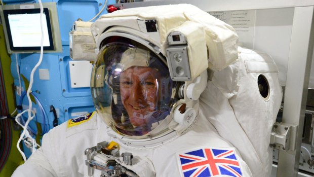European Space Agency astronaut Tim Peake, of Britain, during the final fit check of his spacesuit before his International Space Station spacewalk.