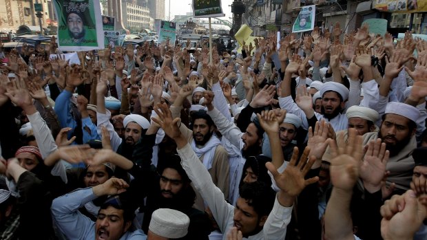 Supporters of Mumtaz Qadri protest against his execution in Peshawar on Monday.