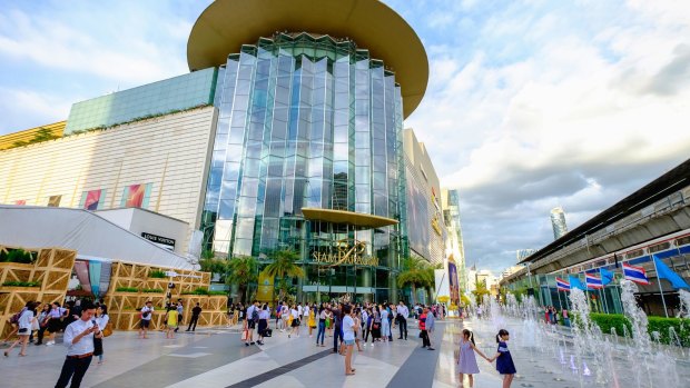 Shoppers visit Siam Paragon mall in Bangkok. Siam Paragon is one of the largest malls in the world. Photo: Shutterstock