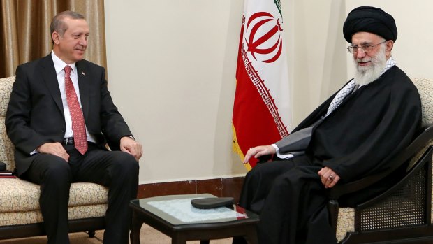 Iran's Supreme Leader Ayatollah Ali Khamenei, right, talks with Turkish President Recep Tayyip Erdogan during their meeting in Tehran on April 7.
