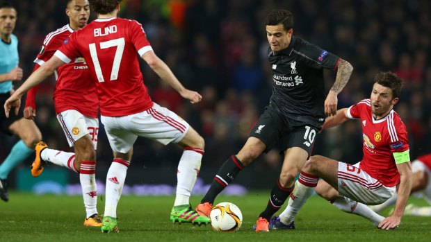 Scored: Philippe Coutinho dribbles past his Manchester United opponents.