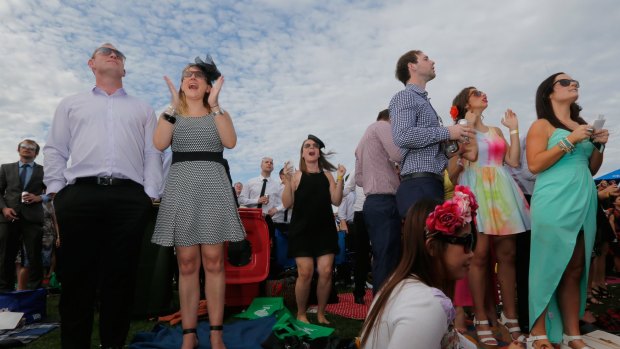 Racegoers enjoy the warm weather on Caulfield Cup Day, but the good run is about to end. 