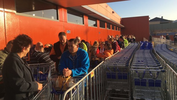 Shoppers brave the chilly conditions to get a taste of Aldi in Kwinana.