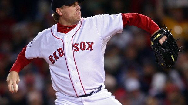 Curt Schilling pitches for the Boston Red Sox during the 2007 Major League Baseball World Series at Fenway Park.